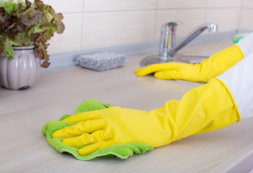 Commercial cleaner working in a Highbury office reception area